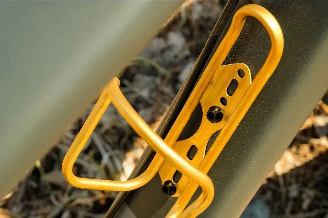 Wolf Tooth Components Morse Cages Available in Limited Edition Gold Finish